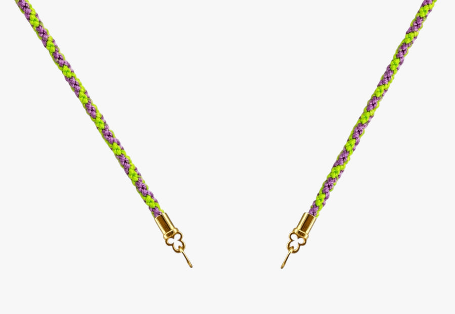 Sour Grape Candy Stripes hand-braided silk cord necklace with solid 14K yellow gold quatrefoil cord ends.