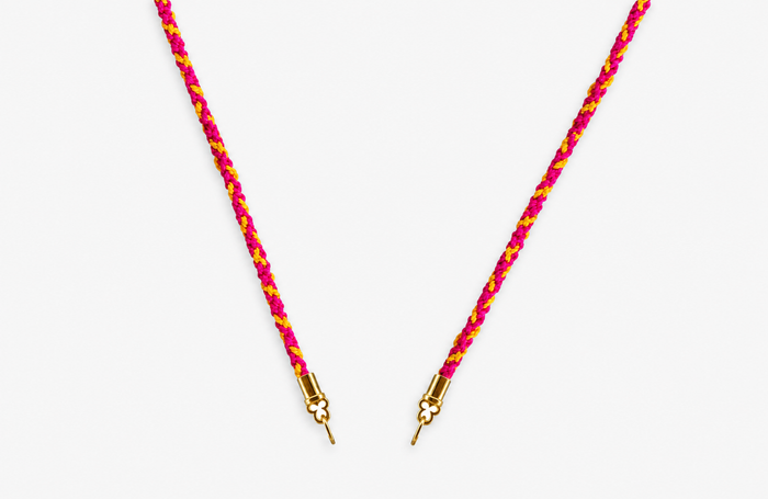 Rock Candy Candy Stripes hand-braided silk cord necklace in pink, fuchsia, and marigold with solid 14K yellow gold quatrefoil cord ends.